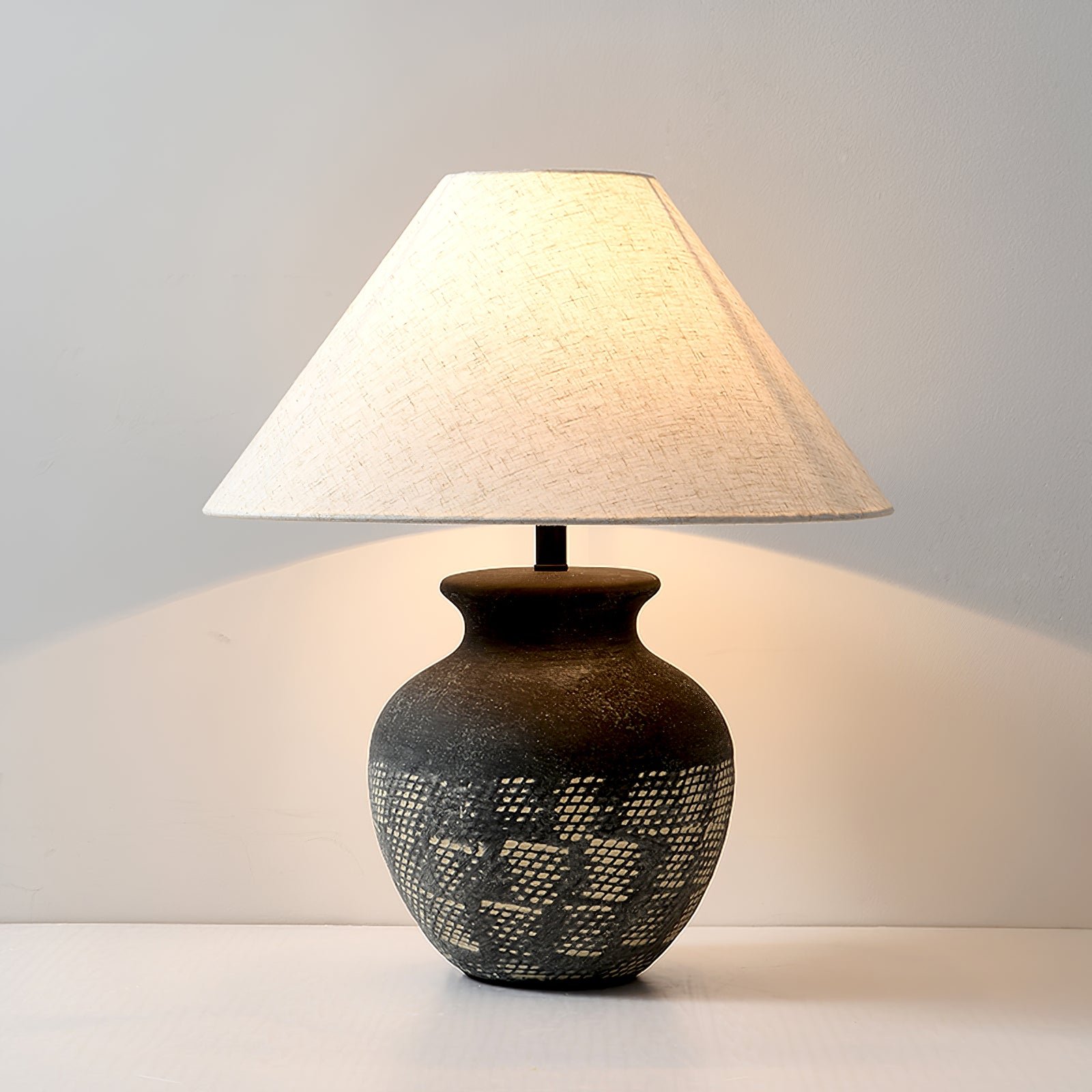 Ansel Ceramic Table Lamp measuring 17.7" in diameter and 20" in height (45cm x 51cm) with a black and beige color combination and a UK plug.