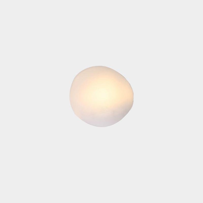 Model D White Pebble Wall Lamp: Dimensions 7.8 inches Diameter x 8.6 inches Height (20cm x 22cm), emits Cool Light.