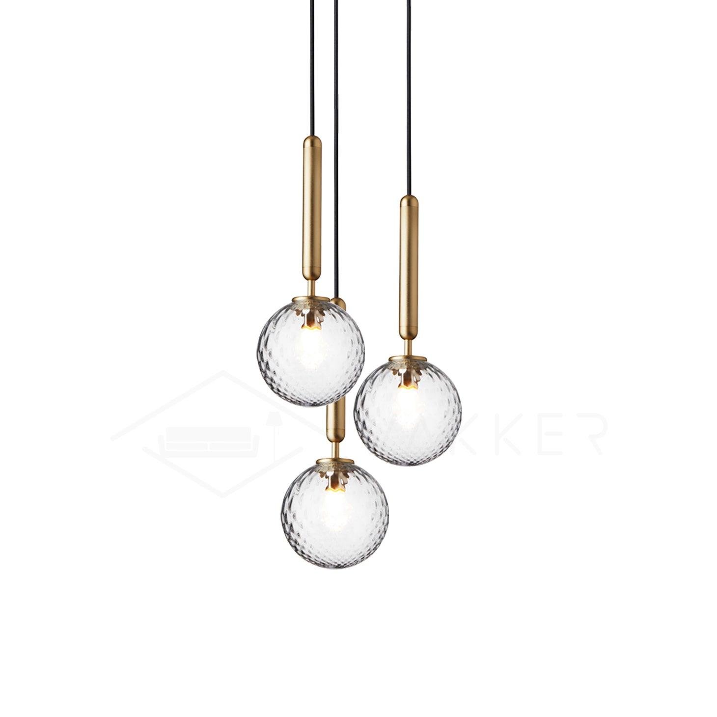 Miira Pendant Light with 3 Heads, measuring 7.9 inches in diameter and 59 inches in height, or 20cm in diameter and 150cm in height. The pendant light is available in a gold finish with a clear appearance.
