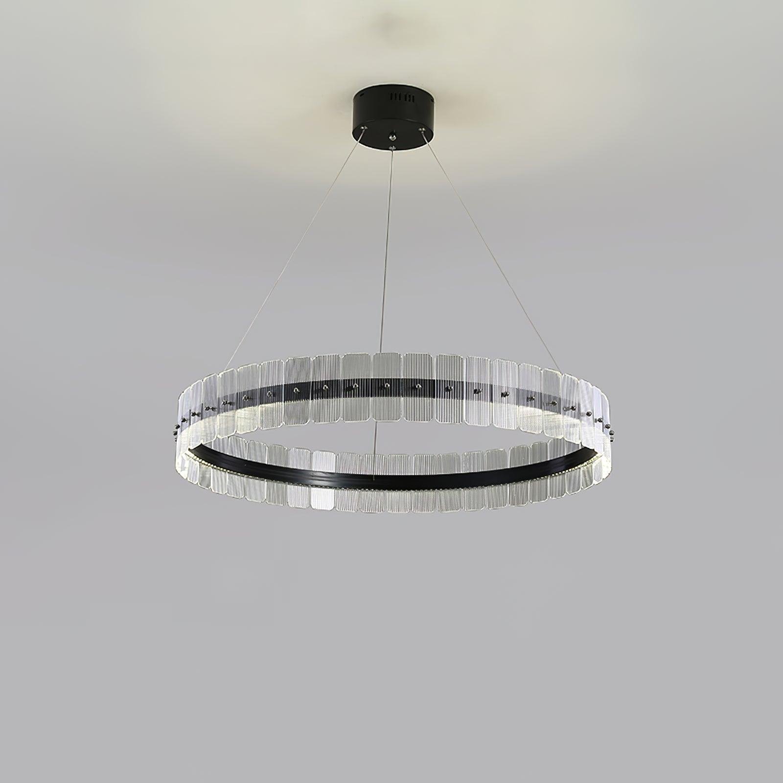 Chandelier Saturno featuring LED lights, with a diameter of 31.4 inches and a height of 4.7 inches (80cm x 12cm), in a sleek black and opaque design, emitting a cool white glow.