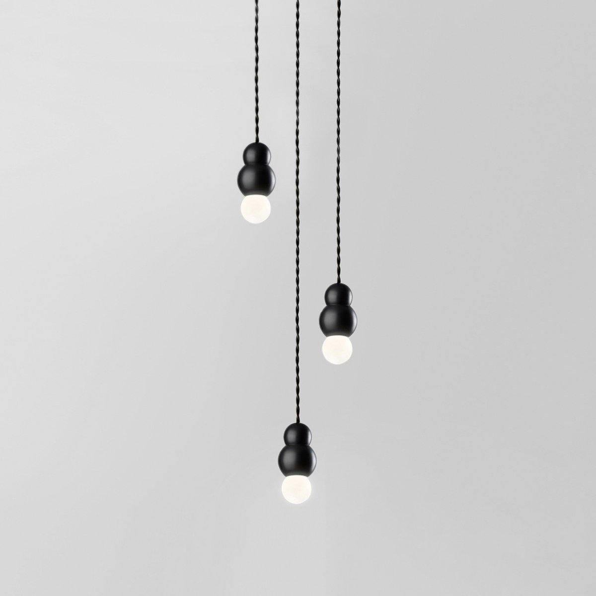 Black Ball Light Pendant Series 3heads with a diameter of 3.9 inches and a height of 6.81 inches (10cm x 17.3cm), featuring a flexible design.