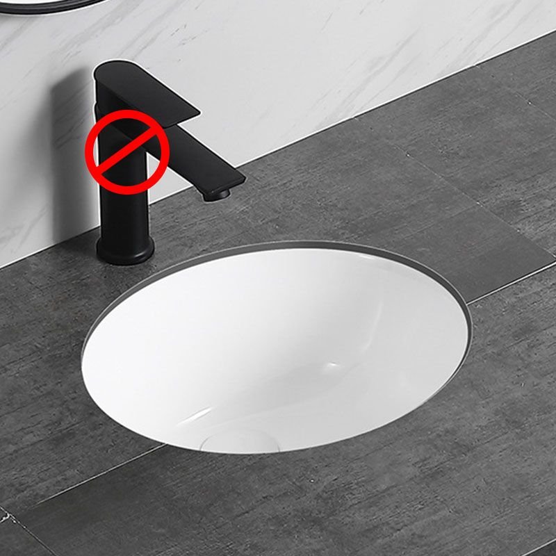 Modern Bathroom Sink: Oval Porcelain Undermount Vanity Sink with Pop-Up Drain - Dimensions: 16"L x 13"W x 7"H